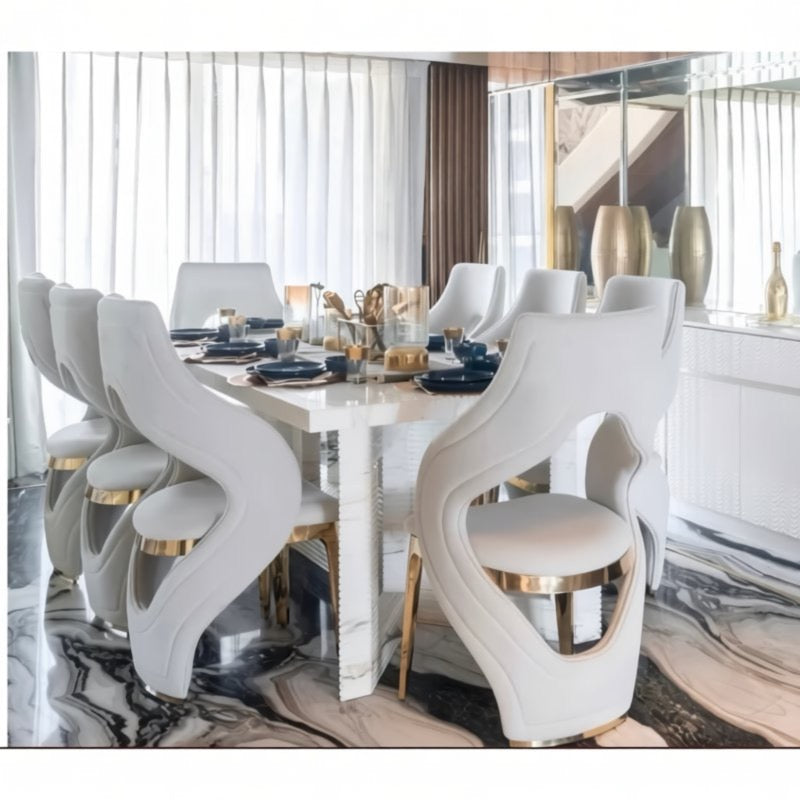 a luxurious dining room with a white marble table and chairs, a white chandelier, and a marble floor.